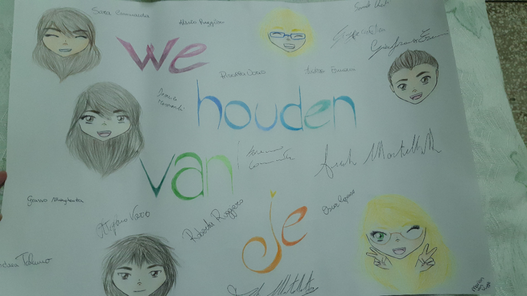 foto van een poster met de handtekeningen van alle jongeren uit de kerk en de tekst: We houden van je